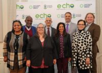 A group photo of people that includes Dr. Andrea Berry-Brown, Ralph Smith, David Jacobson, and Swati Adarkar.