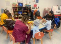 Families at school working around a table