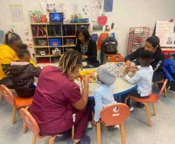 Families at school working around a table
